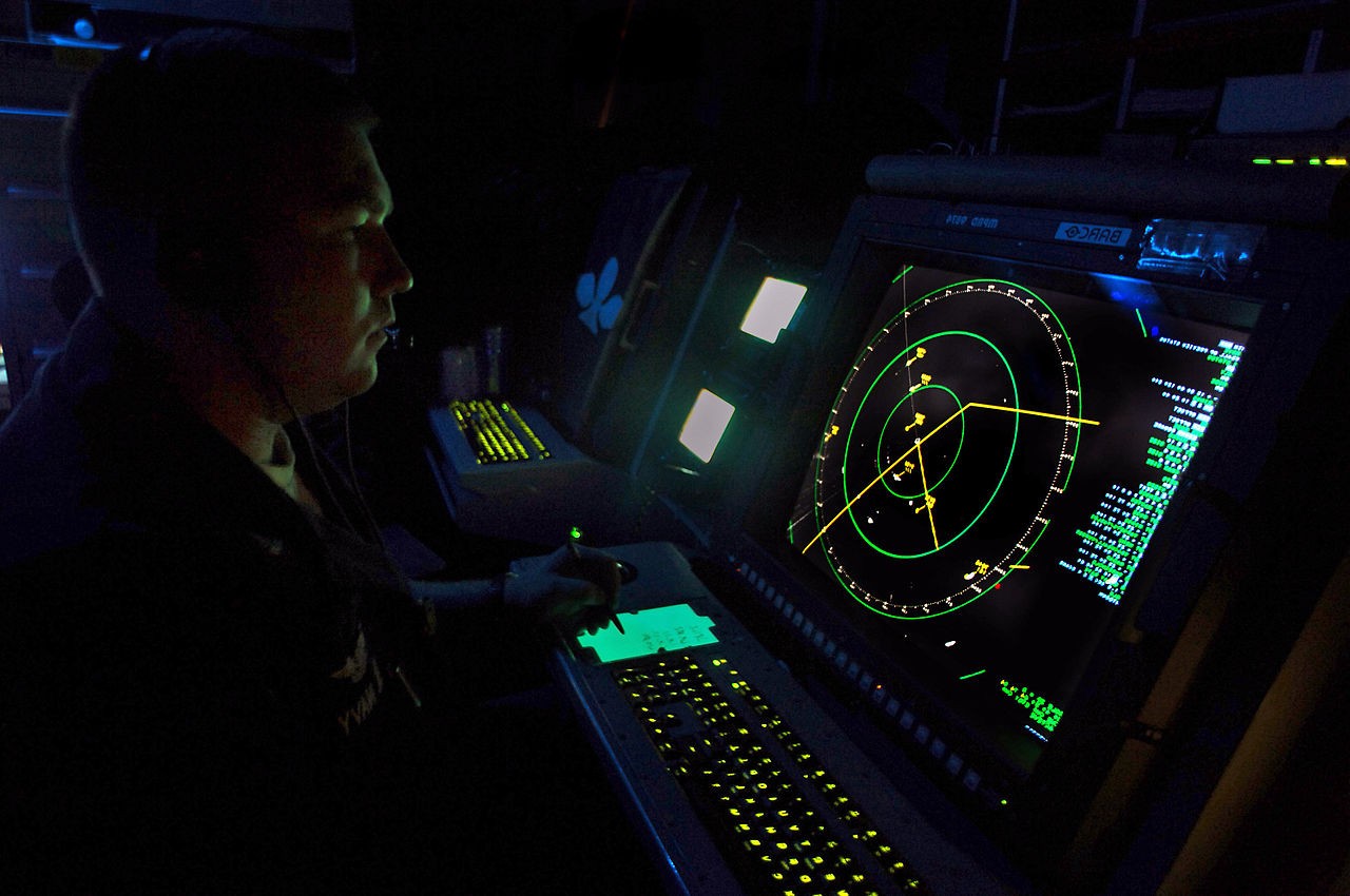 US_Navy_070913-N-1786N-051_Air_Traffic_Controller_2nd_Class_Branden_Powell_keeps_track_of_aircraft_using_a_SPN-43_radar_screen_during_routine_flight_operations_on_board_amphibious_assault_ship_USS_Tarawa_LHA_1-e1378845925957.jpg